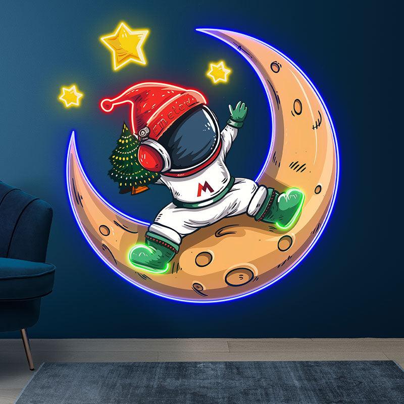 Christmas miracle on the moon: astronauts in Santa hats, holding Christmas trees neon signs